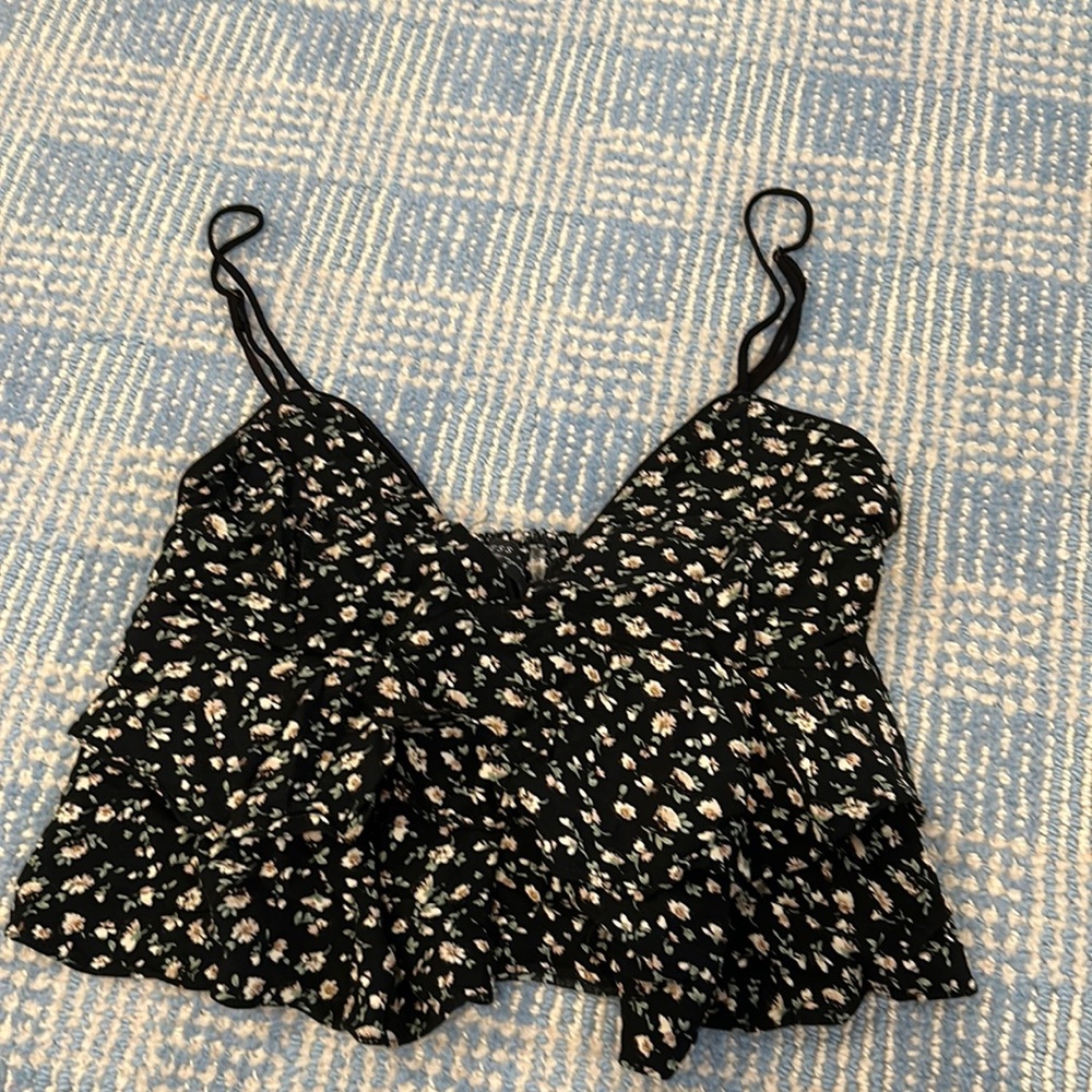 Black floral ruffle tank